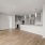 Penthouse Living Room and Kitchen with Built-In Shelves